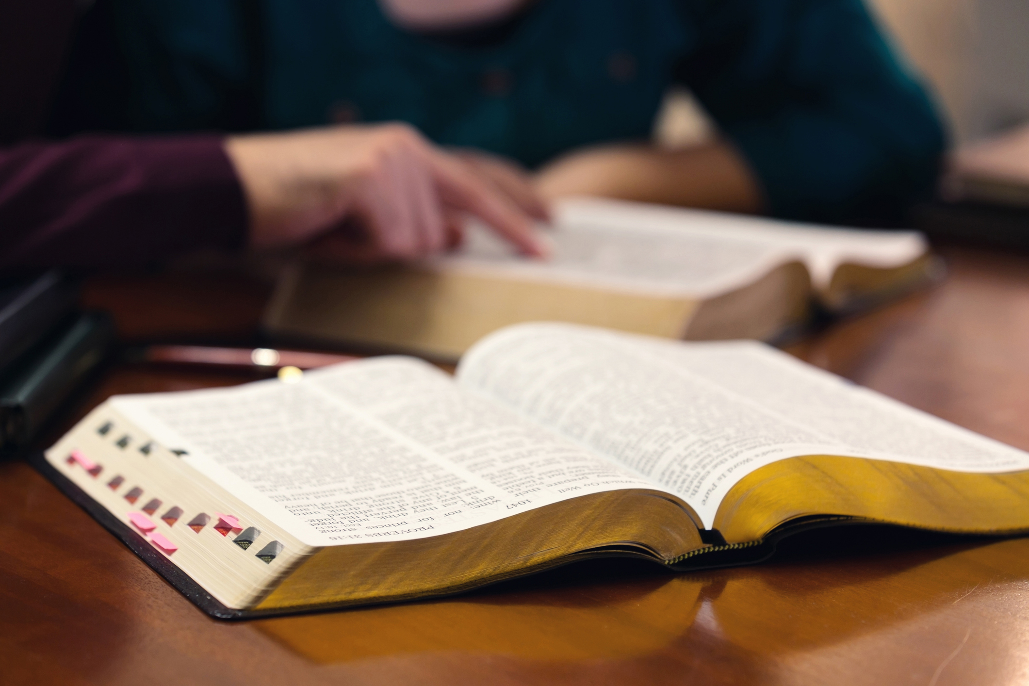 Young couple studying the Word of God together